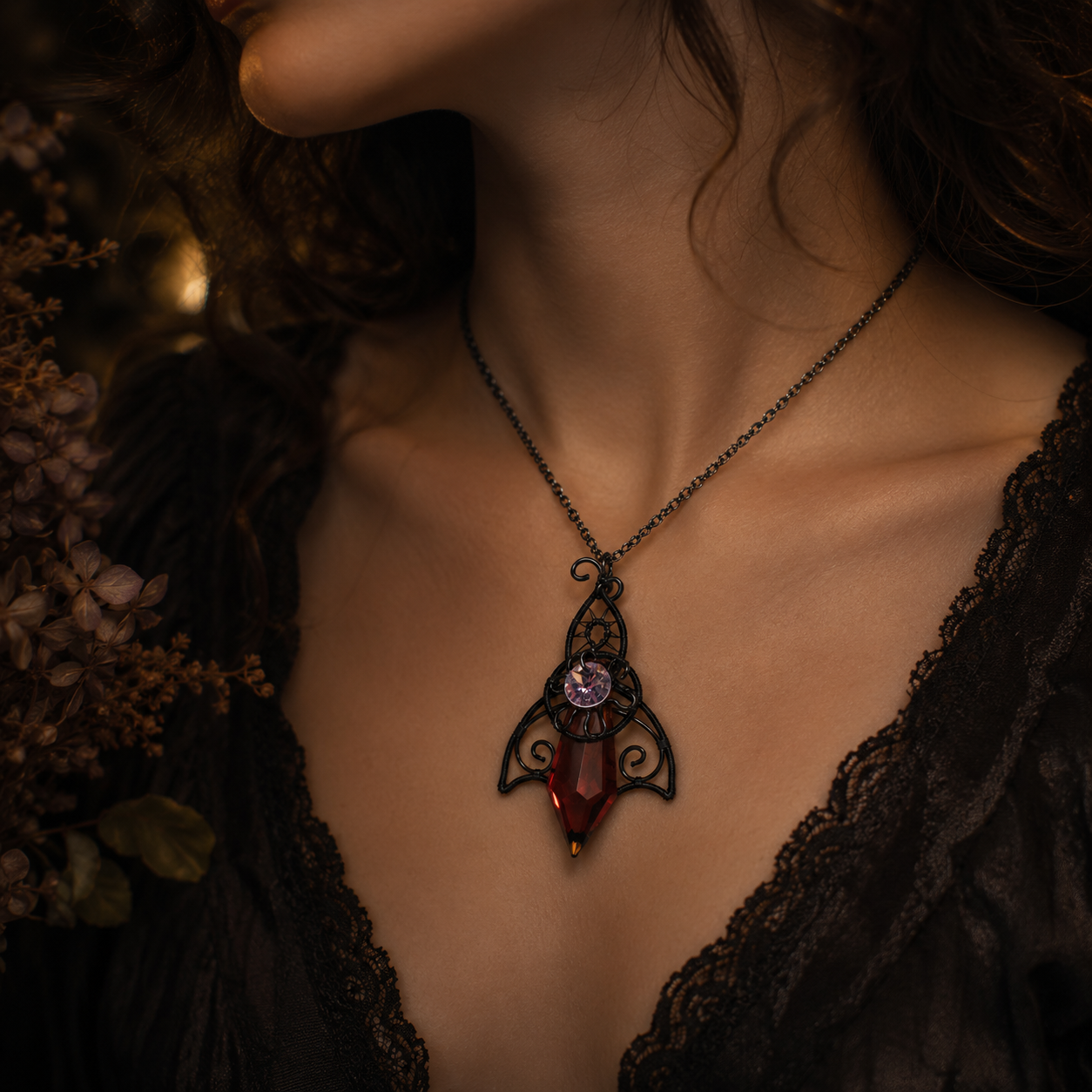 Twilight Talisman gothic pendant worn on a woman with black lace clothing